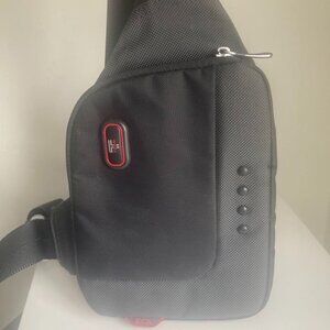 TUMI Tech sling bag - Never Used